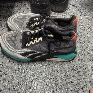 Reebok Sneakers in Black, White, and Teal